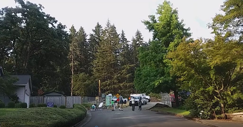 Witnesses gathered early Monday for the start of logging at the East 40th project site. The state is reviewing EWEB's erosion permit.