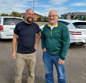 Pastor Gabe and Arlen Rexius meet at the future site of Everyone Village during a recent Open House.
