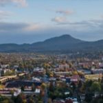 Champtey (Rattlesnake Butte) rises in the distance above Southeast Eugene, Oregon.